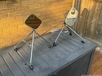 Both chrome towing mirrors standing on tripod supports, mirror faces visible