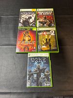 Front view of all five Xbox game cases