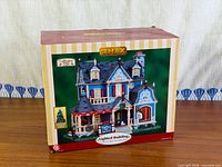 Front of boxed Lemax lighted building