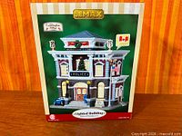 Front view of boxed Lemax Police Precinct 13 lighted building