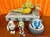 Full set showing Jabba on throne, Salacious Crumb, Max Rebo Band figures and accessories