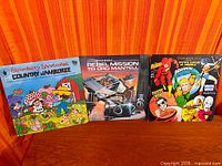 Front covers of all three LPs side by side