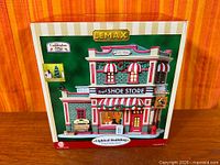 Front of sealed Lemax Regal Shoes Store box
