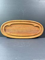 Top view of oval wooden tray