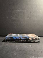 Blue Velvet and Inland Empire DVD cases stacked, spine titles visible