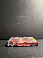 Spines of both DVD cases showing titles