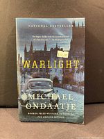 Front cover of Warlight paperback showing title, author and price sticker