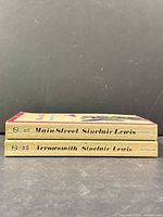 Spine view of both paperbacks stacked