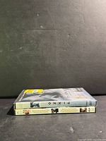 Both DVD cases stacked showing spines