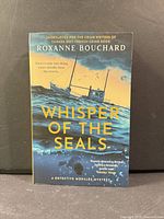 Front cover showing title, author, series, award mention