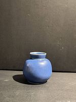 Front view of blue ceramic vase