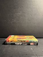 Two DVD cases stacked: spines of The Italian Job and The Bank Job visible