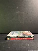 Both DVD cases stacked, showing spines