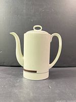Front view of Wedgwood Prelude teapot showing shape, handle, lid and brown accent band