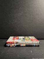 Both DVD cases stacked showing spines