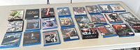 Full tabletop view of approximately 25 movie cases