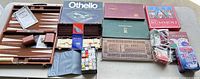 Overall view showing backgammon set, Othello, domino case, cribbage board, Rummoli, card holders and playing card case