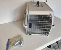 Petmate carrier frontal view with accessories bag