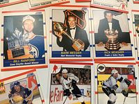 Close-up of award winner cards Bill Ranford, Mark Messier, Rick Meagher