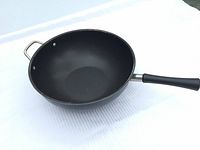 Top view of wok showing interior and helper handle