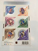 Full view of the intact 6-stamp sheet