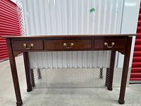 Front view showing entire console table and three drawers