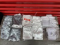 Overview of grouped satin, organza and mesh drawstring bags on table