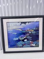 Front view of framed water lily pond print