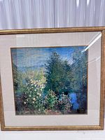 Front view of framed Monet-style print with frame and mat visible