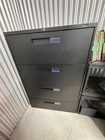 Front view showing four drawers and lock core