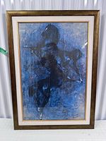 Full view of framed abstract horse print