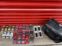 Overview of lash trays and carrying case laid out on table
