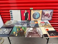 Overall lot showing all LP covers on table