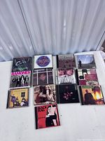 Front view of entire CD lot laid out on table