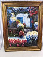 Front view of framed floral Mediterranean oil painting