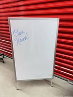 Front view of whiteboard showing writing surface and overall condition