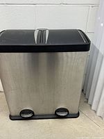 Front view of stainless steel dual-compartment step bin