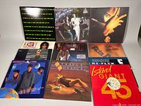 Group shot of 10 records laid out showing front jackets and general condition