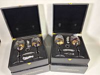 Both Bezrat gift boxes open showing contents