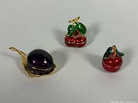 overview of three fruit trinket boxes