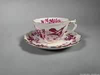 Coalport teacup on saucer, side profile showing pattern and shape
