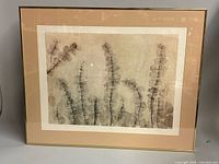 Front view of framed print showing artwork, mat, and frame