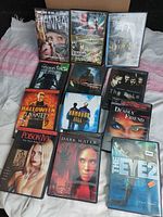 All 12 DVD cases laid out