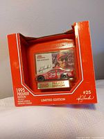 Front view of boxed 1:64 Premier Edition Ken Schrader #25 Budweiser car