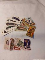 Full lot overview showing mixed stack of automobile, bird and object cards