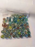Full view of bag showing variety of marbles