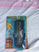 Front view of sealed FunSlides Carpet Skates package