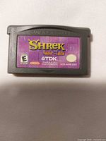 Front view of Shrek: Hassle at the Castle GBA cartridge showing label
