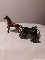 Side view showing full horse and buggy