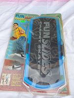 Front view of sealed FunSlides Carpet Skates package